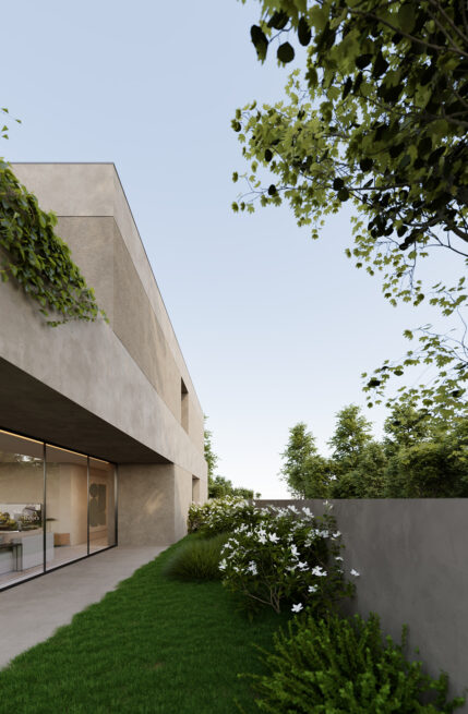 Avanca House, Avanca, Aveiro: narrow side garden between the glazed ground floor and a boundary wall, under the cantilever