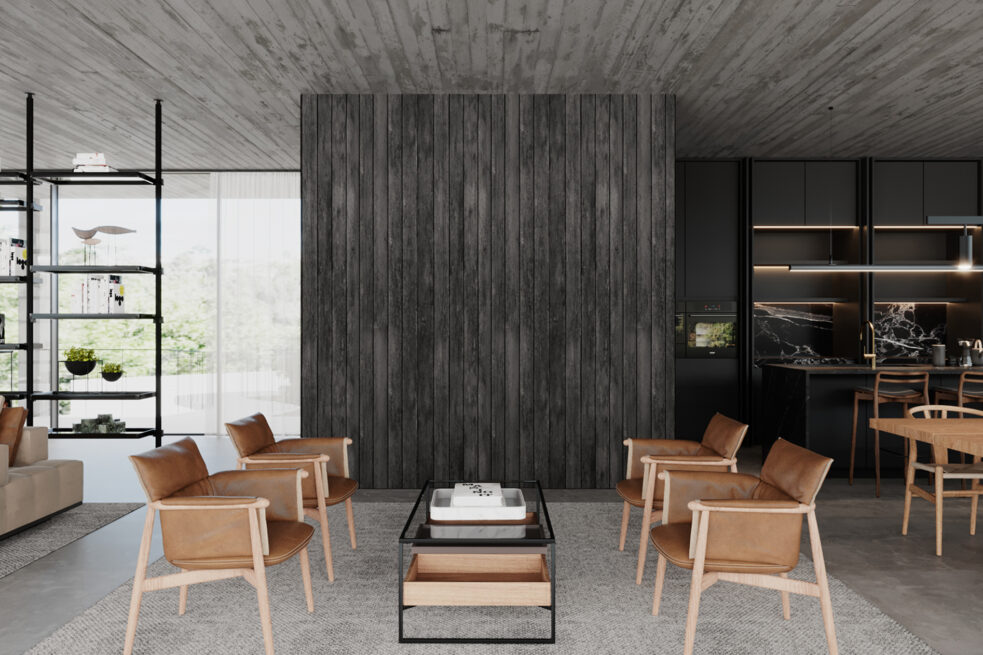 CC House, Marco de Canaveses: sitting corner with wooden armchairs and a low table beside a dark kitchen wall