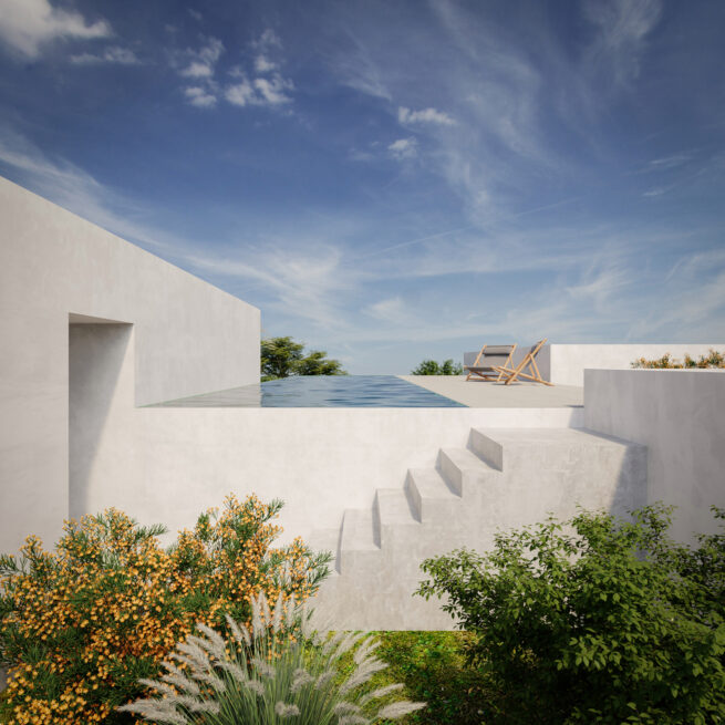 White walls and steps leading up to a pool edge at the top of the garden of ST House in Santo Tirso