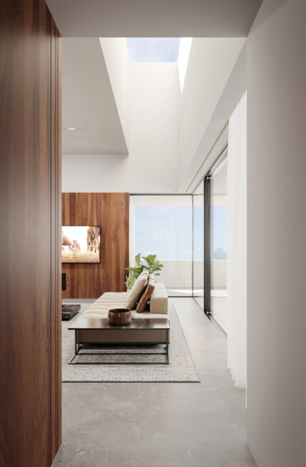 ST House, Santo Tirso: render of a corridor opening onto the living room, lit by a skylight above