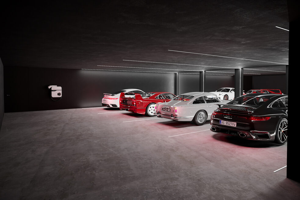 Fafe House: render of an underground garage with a row of sports cars under red-tinted light