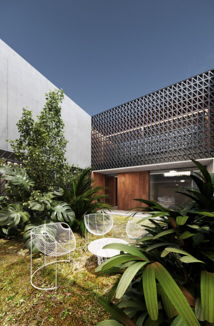 Render of the planted patio of the HU1950 in Vila Nova de Gaia complex seen from the corner, the screen against the sky